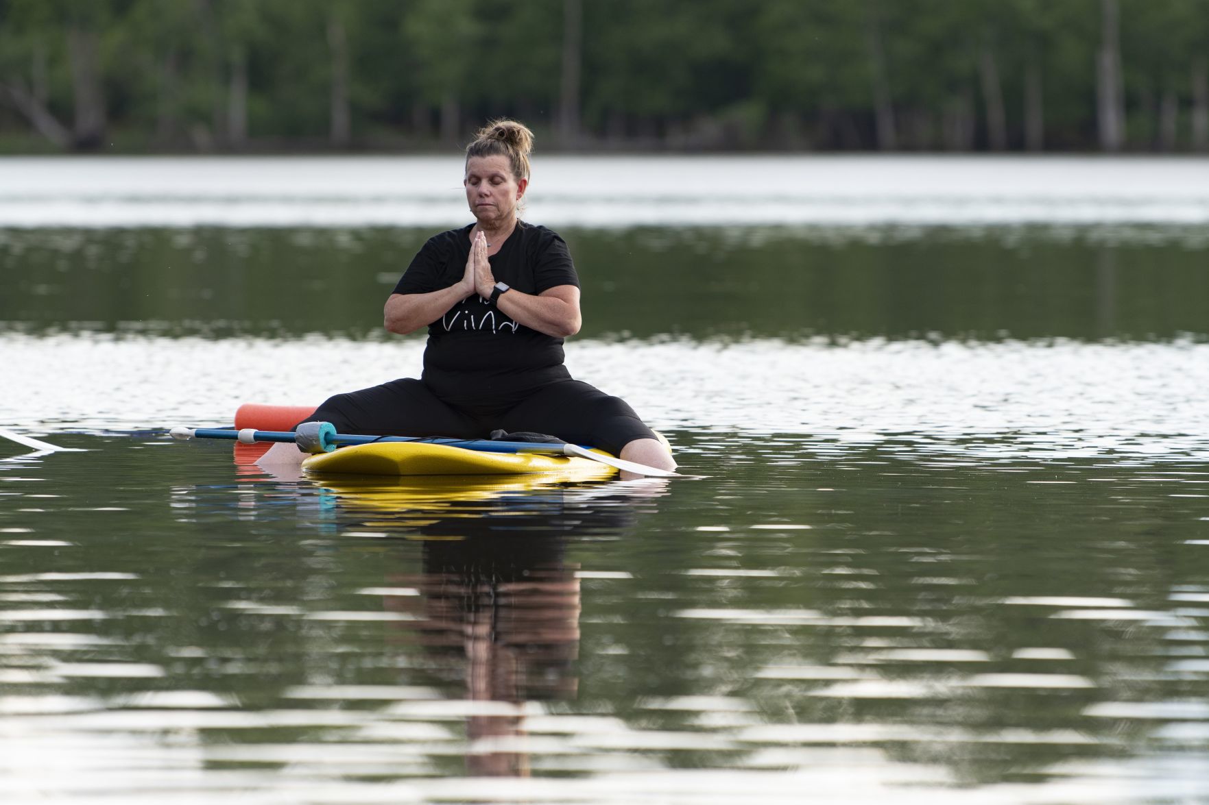 Paddleboard yoga at Creve Coeur Lake
